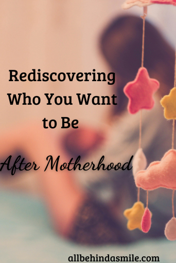 Image of a woman holding a baby in the background with text Rediscovering Who You Want to Be After Motherhood