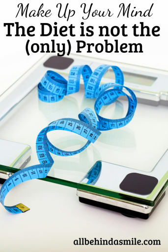 Image of a scale with blue measuring tape on it and the text Make Up Your Mind The Diet is not the (Only) Problem